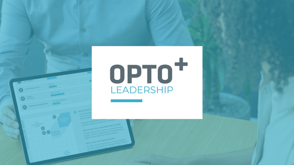 A recruitment setting where the recruiting leader is interviewing a candidate using OPTO+ Leadership.